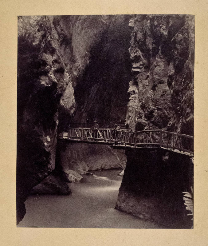Untitled (Two Men on a Mountain Bridge)