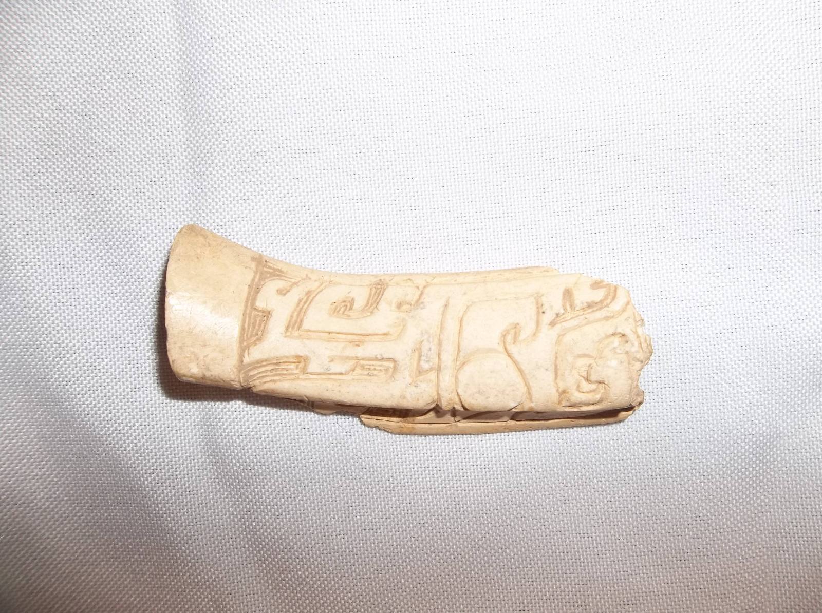 Fragment of a Spatula with Carved Taotie Decoration