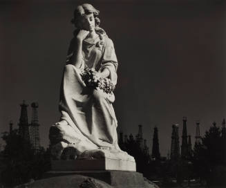 Cemetery Statue and Oil Derricks, Long Beach, California