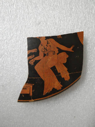 Red-Figure Lekanis Lid Fragment: Woman Sitting on a Rock