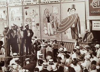 Ringling Bros. Barnum & Bailey, Rockford, IL (black minstrels in front of crowd, figural circus tarps)