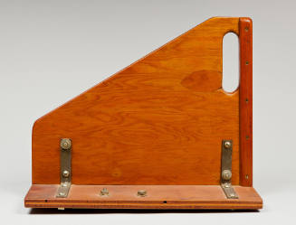 Handmade rudder-like wooden object