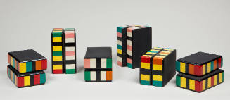 Set of twelve painted wooden juggler's blocks, made by HCW [in JBW studio]