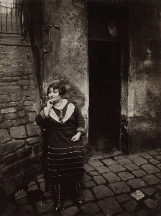 La Villette, rue Asselin, Prostitute in Front of her Door, 19th, March 7, 1921 (La Villette, rue Asselin, fille publique faisant le quart devant sa porte, 19e, 7 mars, 1921)