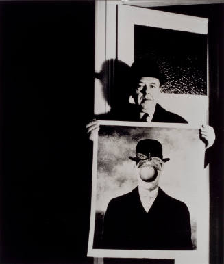 René Magritte with His Picture 'The Great War,' Brussels
