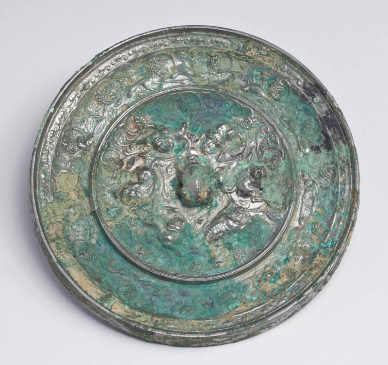 Mirror with Lion and Grapevine Motif