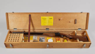 Box containing gun, bullets, etc., box made by HCW