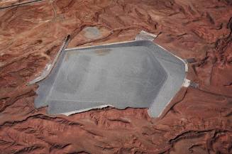 Uranium Disposal Cell containing 1.3 million tons of toxic waste and uranium tailings, along with the mill, buildings, and a schoolhouse, constructed from contaminated material, Mexican Hat, Utah