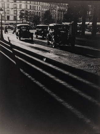 Les taxis sur le pont de Montparnasse, Paris, (cars and long shadows)