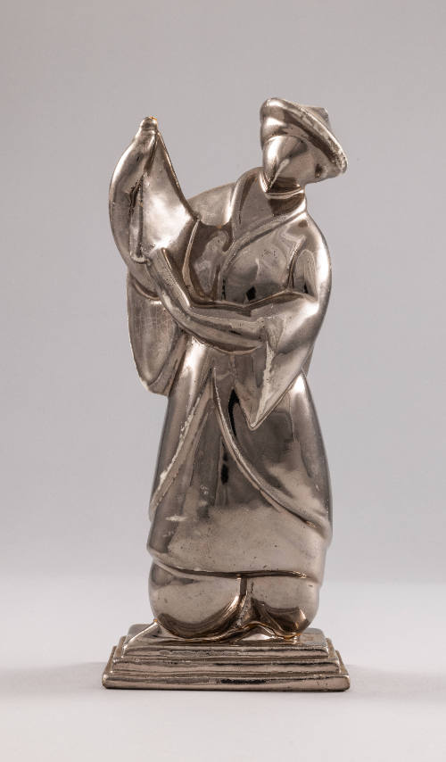 Figure with Musical Instrument