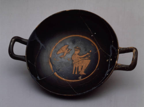 Red-Figure Kylix: Seated Woman Juggling Balls with Flying Eros Figure