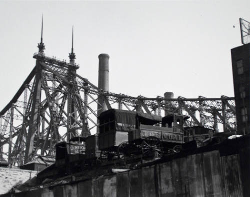 Untitled (Looking up at ice/coal trucks and bridge)