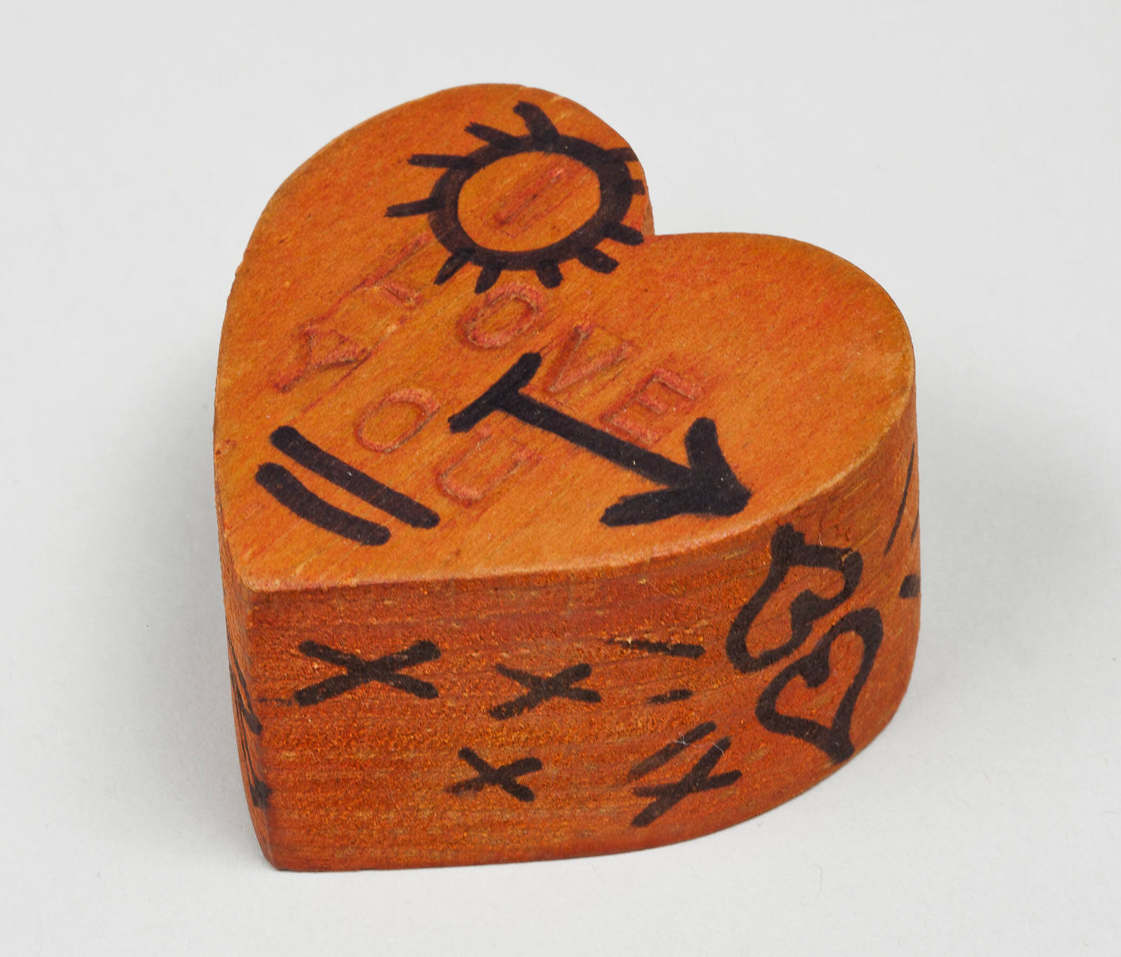 Untitled (small wooden heart)