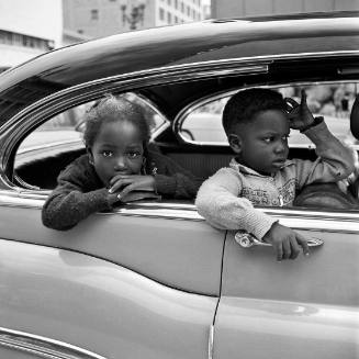 Two Children in a Car