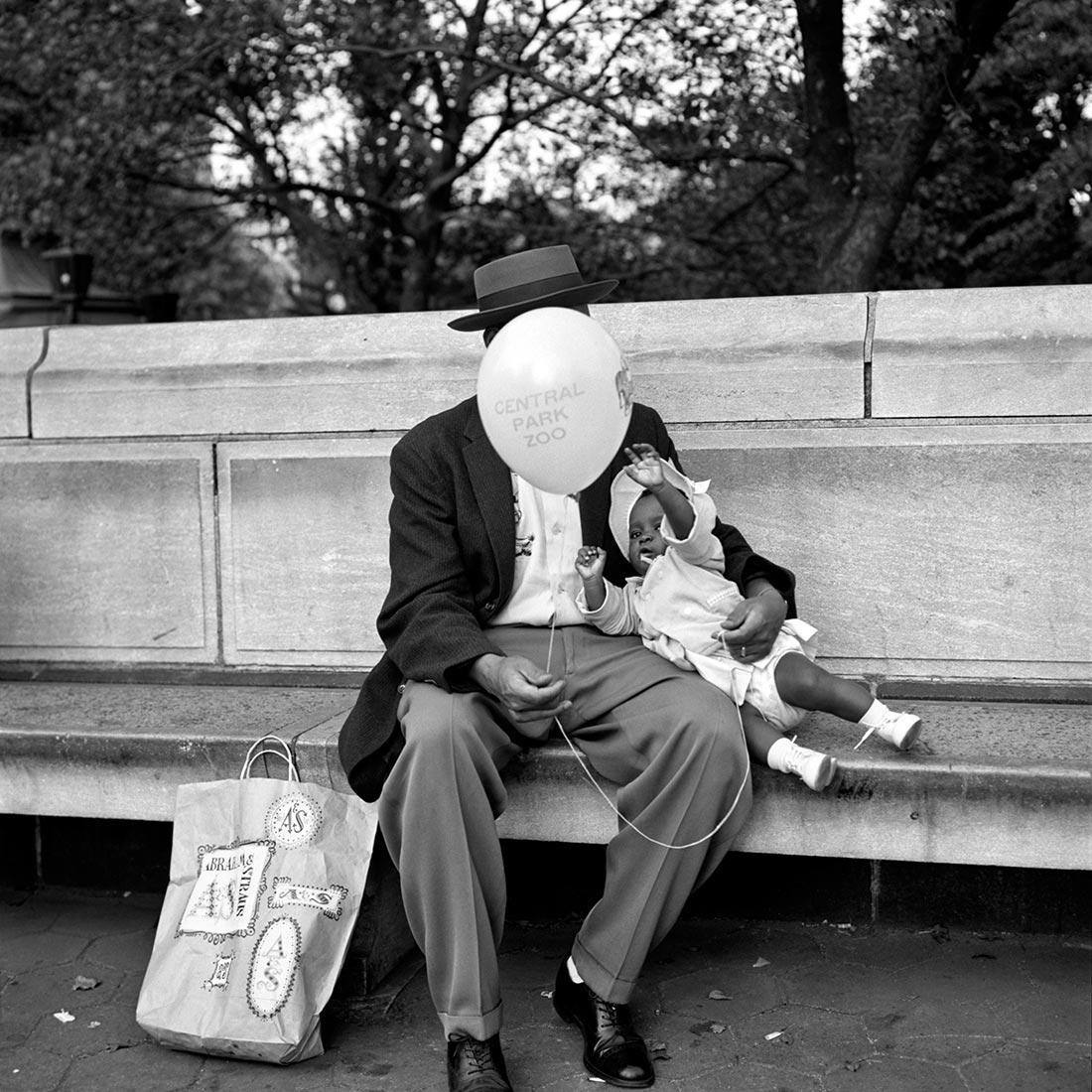 Man Sitting with a Child