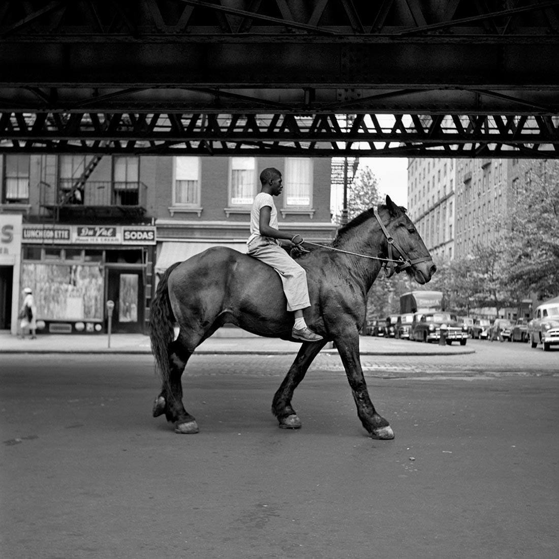 Figure on a Horse under the El Train