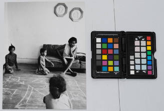 Girls playing with chalks on the apartment floor, Newark, New Jersey