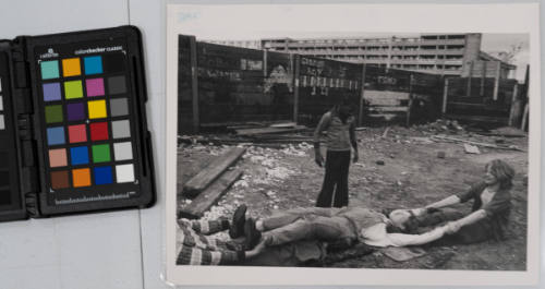 School Truants-- What the Children Do During the Time They Should Be In School: boys pull victim by wrists and ankles as black boy watches, Manchester