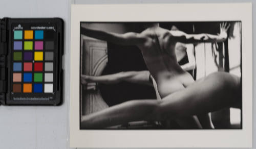 Three nude figures stretch across the frame, USA