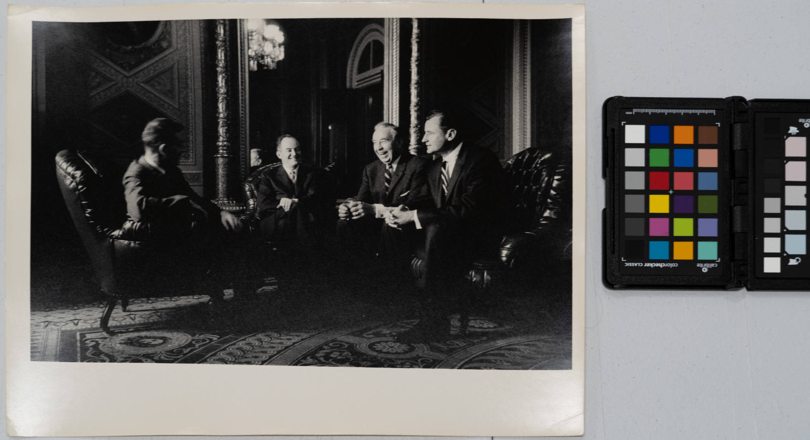 Hubert Humphrey laughing with senators including George Smathers and Andrew Frank Schoeppel