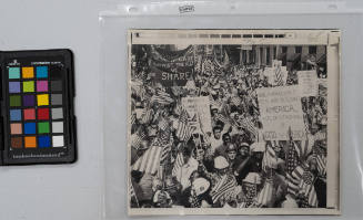 Carrying American flags and signs, construction workers, longshoremen and office workers jam the City Hall area of New York Wednesday in a rally supporting President Nixon's war policy. An estimated 150,000 persons participated in the peaceful assembly, May 21, 1970