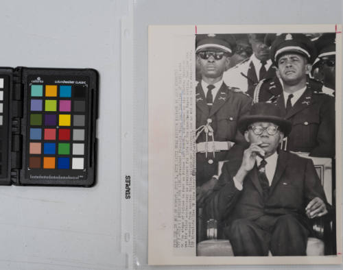 President for Life: President "Papa Doc" Duvalier of Haiti sits on top steps of Palace in Port au Prince, surrounded by his guards. Occasion was his third anniversary as president for life of the Caribbean negro nation. Duvalier has just emerged from another Haitian crisis and observers see no end soon to his despotic rule, June 1967