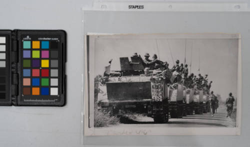 A line of South Vietnamese armored personnel carriers move troops down a highway during a search operation in the Takeo area, 45 miles South of Phnom Penh on November 16, 1970