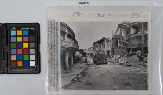 A South Vietnamese soldier walks down the main street of Tonle Bet, Cambodia, June 1st, 1970, shortly after the area was heavily damaged during fighting between Cambodian troops and Viet Cong/North Vietnamese forces