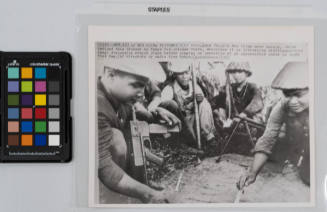 As Red China pictures Viet Cong: Red China’s New China news agency, which radioed this picture to Tokyo for release there, describes it as liberation militiamen, Viet Cong, discussing attack plans before staging an operation at an unspecified place in South Viet Nam, November 1965