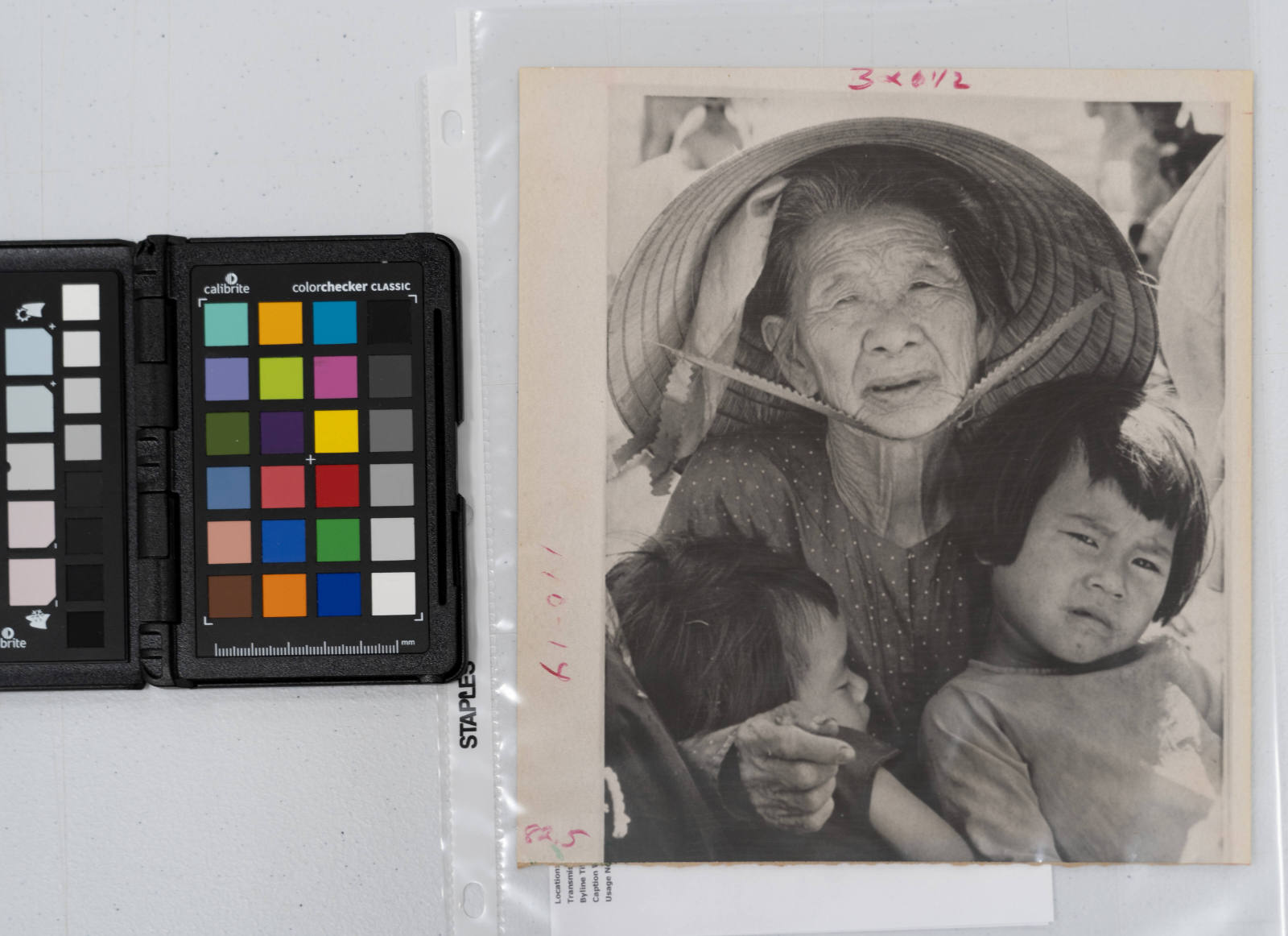 A South Vietnamese woman holds two small children in a refugee camp in Da Nang, South Vietnam. They are from the Northern areas of South Vietnam, forced out by the North Vietnamese Invasion, May 17, 1972