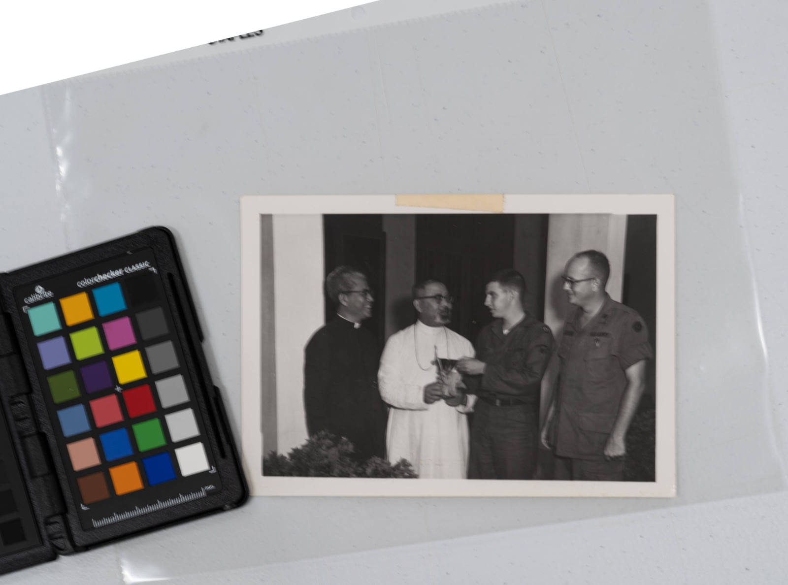 Soldiers from the U.S. Army with Vietnamese priests